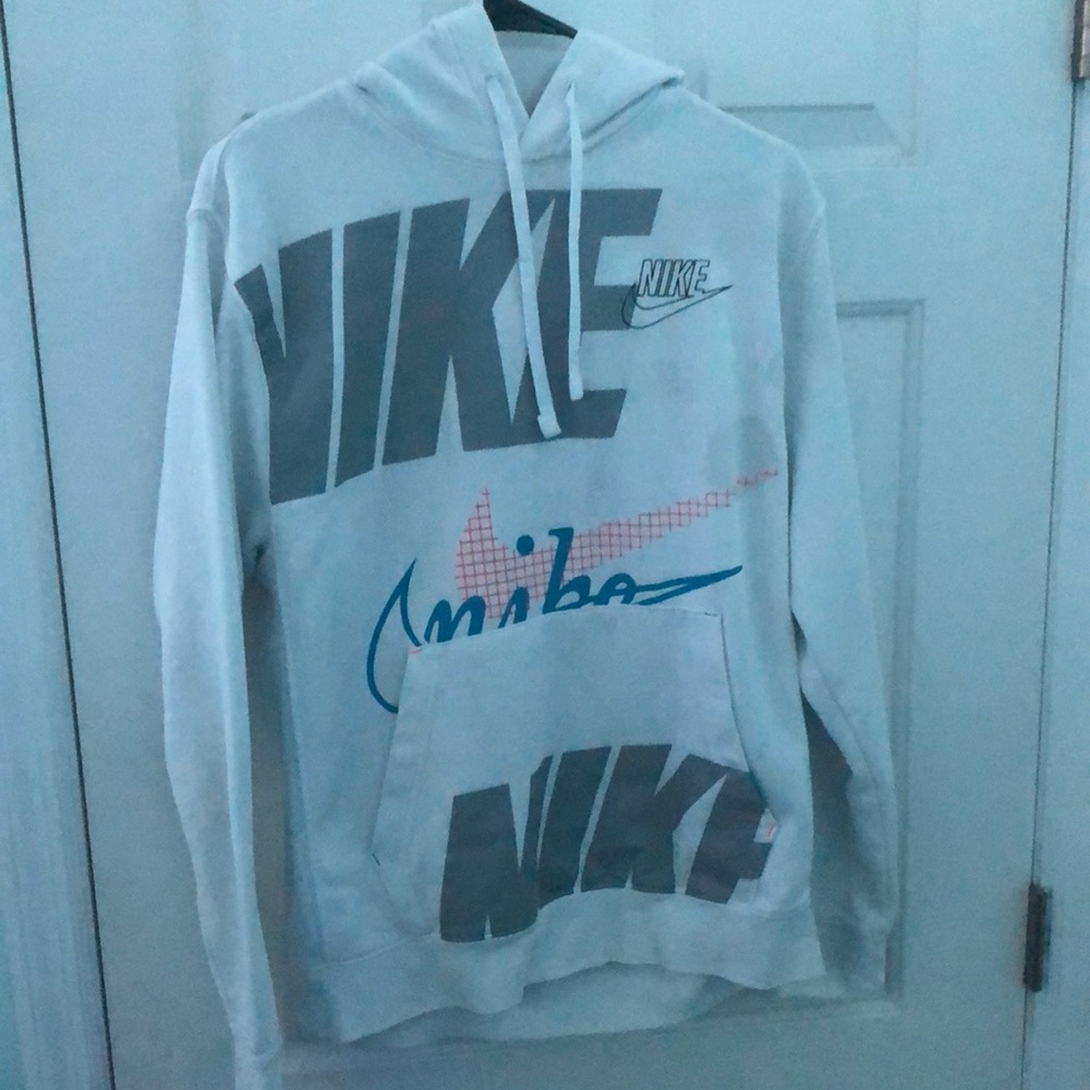 A white medium Nike Hoodie